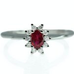 14k white gold 1/3ct ruby ring with diamond halo