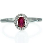 14k white gold .32ct ruby ring with diamond halo