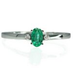 14k white gold .18ct emerald and diamond ring