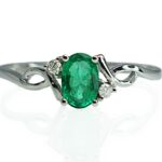 14k white gold .47ct emerald and diamond ring